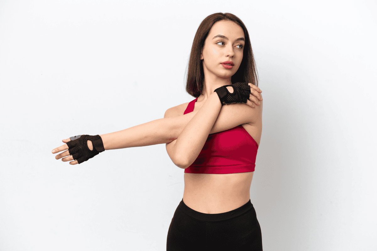 Estiramiento de biceps con la otra mano