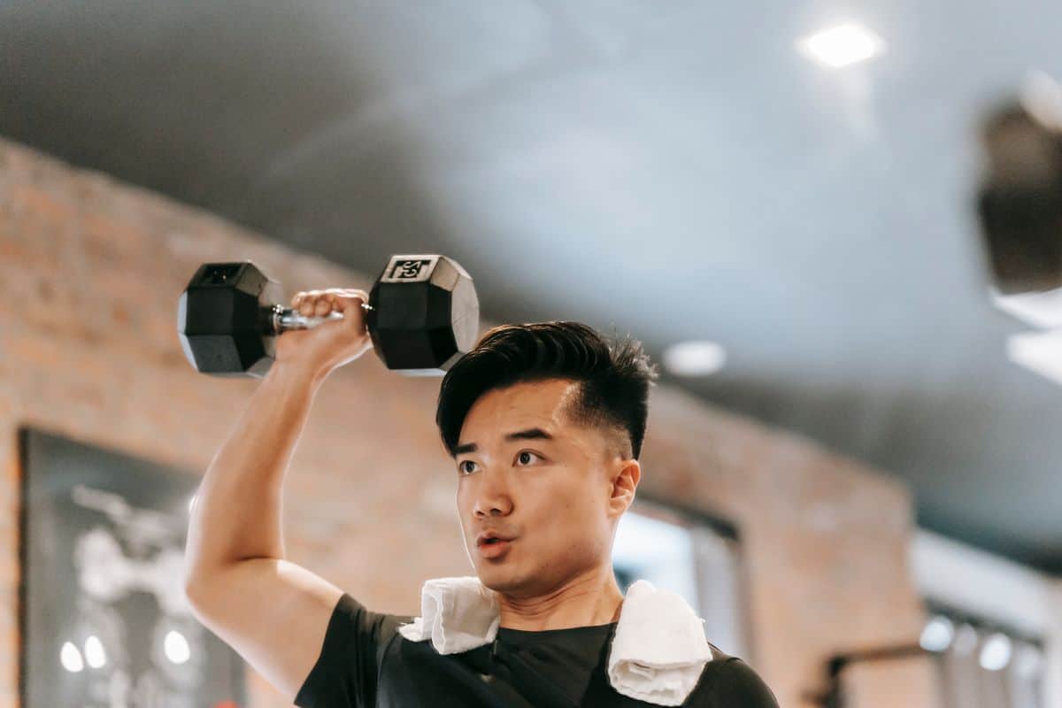 Dumbbell snatch: Guía Técnica, beneficios y errores comunes Brazos alternos snatch